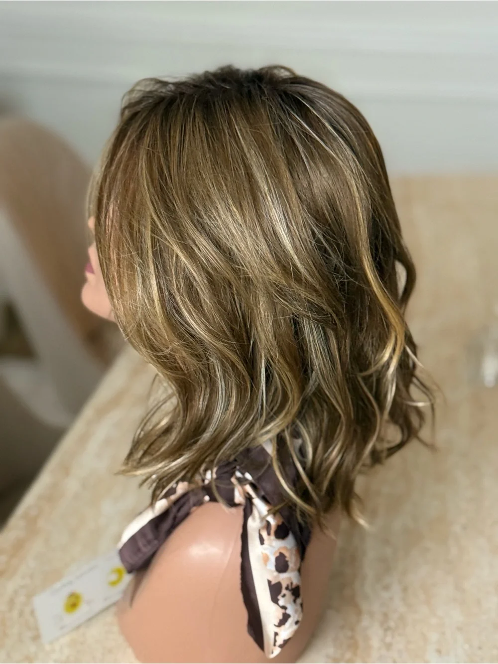 Rene of Paris Loryn Layered Women’s Wig in Mochaccino-R